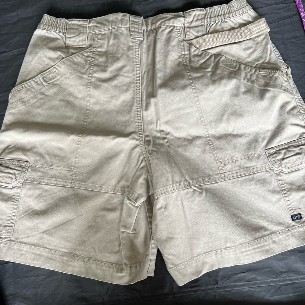 Men’s tan 5.11 cargo shorts. Size 38. Good condition.